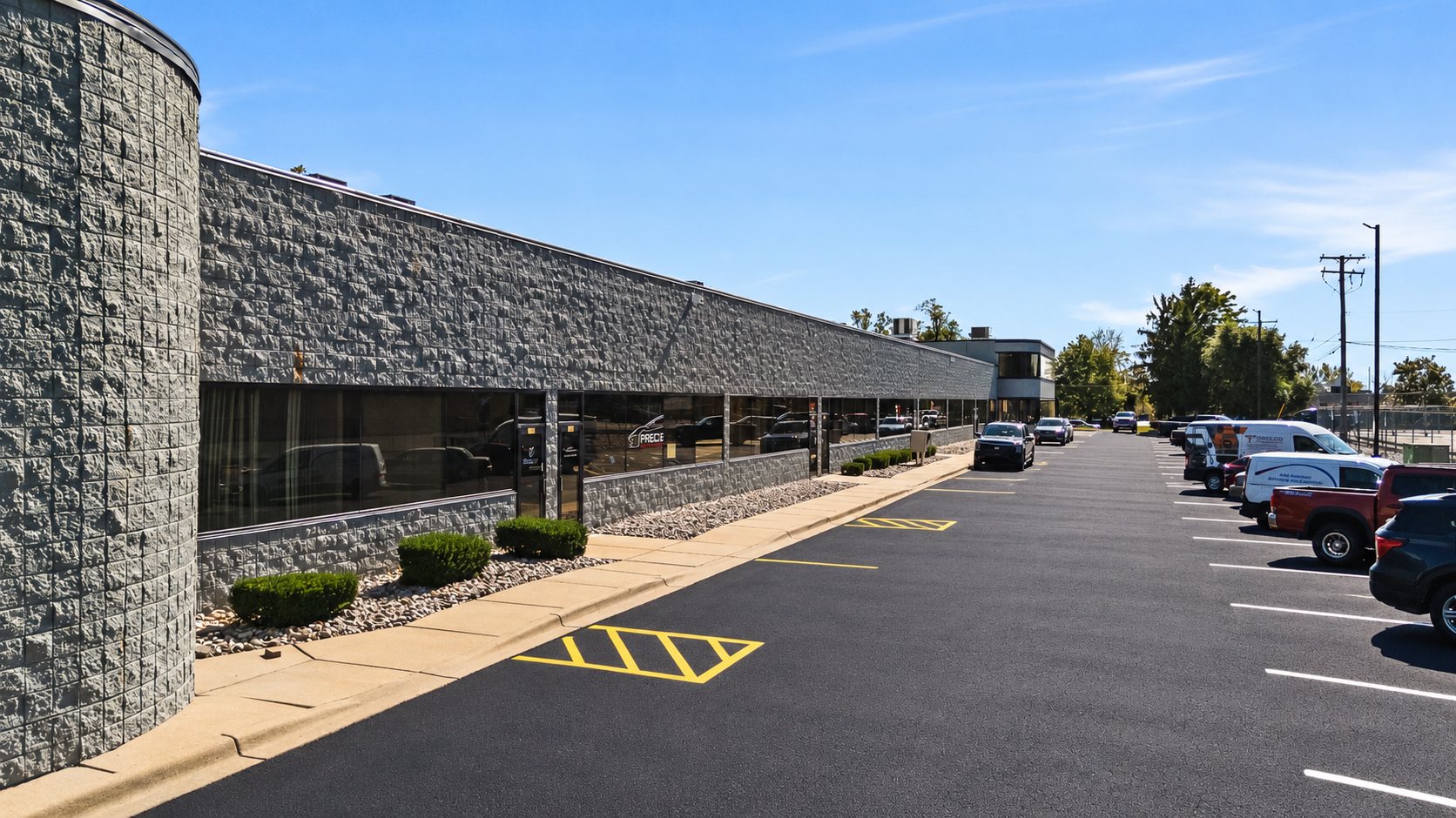 Storefront Office-Warehouse Combo suites with glass storefronts, front walkway and parking